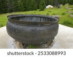 Largest pot in Mongolia, made in 1726, capacity of 1800 liters. The grounds of the Manzushir Monastery located in the south of protected Bogd Khan Mountain, 8 km northeast of Zuunmod town, Mongolia