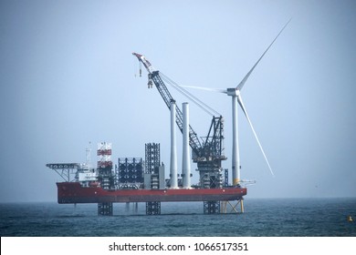 The largest wind farm installation vessel in the world and the first turbine installed off the coast of Aberdeen. Balmedie, Aberdeenshire, Scotland, UK. April 11th 2018