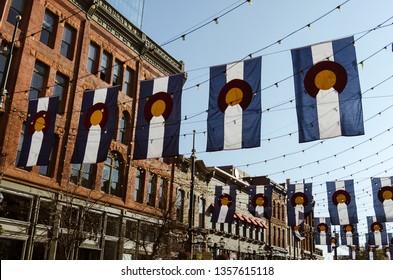 Larimer Street In Denver With Colorado Flags