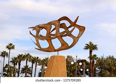 LARNACA, CYPRUS - MARCH 03, 2019: Golden Flying Seagull Bird Sculpture On The Larnaca Beach