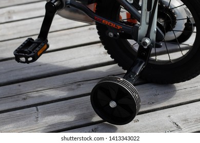 Larvik, Norway - May 31st 2019: Kids Bike With Support Wheels. 