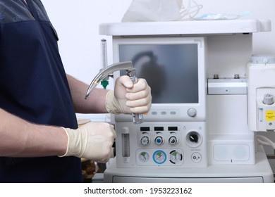 Laryngoscope In The Hands Of An Anesthesiologist. Tracheal Intubation. Preparation Of Equipment For Surgery Under General Anesthesia.Airway Patency.Ventilation Of Lungs.