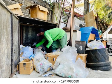 Las Pinas City, Philippines April 1,2021 GOOD FRIDAY Is A Religious National Holiday In The Philippines. While Filipinos Refrain From Worldly Activities, This Man Picks Up Garbage To Feed His Family