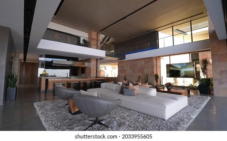 Las Vegas, 30 August 2021: Spacious Big Living Room Of Luxurious Estate With Wooden Elements. Modern Mansion Interior With With A New Stylish Furniture Design Concept For Residential Home.