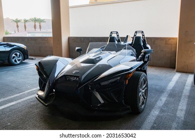 Las Vegas, APR 13, 2021 - Cool Polaris Slingshot Vehicle Paked In Lake Las Vegas