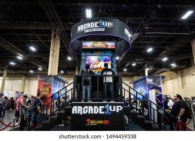 LAS VEGAS - AUGUST 3, 2019: Attendees playing Marvel Super Heroes on an Arcade 1UP retro cabinet machine at eSports tournament EVO 2019 Evolution Championship Series at Mandalay Bay Events Center.