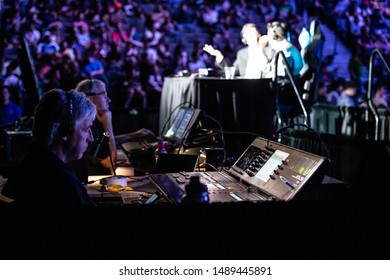 LAS VEGAS - AUGUST 4, 2019: Stage audio and video mixing manager overseeing the production at eSports tournament EVO 2019 Evolution Championship Series at Mandalay Bay Events Center.