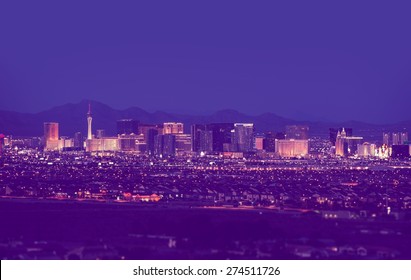 Las Vegas Cityscape At Night In Vintage Purple Color Grading. Las Vegas, Nevada, United States.