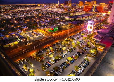 LAS VEGAS, NEVADA - FEBRUARY 23, 2020: Evening view across Las Vegas from above with lights and  resort casino hotels in view. 