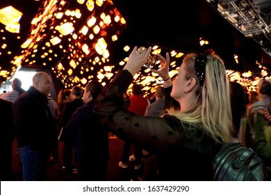 LAS VEGAS, NEVADA - January 8, 2020: Beautiful Young Girl Taking Pictures Of The LG Flexible Displays At The Annual Consumer Electronics Show