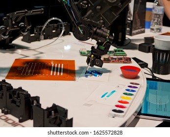 LAS VEGAS, NEVADA - January 9, 2020: Closeup Of A 3D Printed Robotic Arm Paint Drawing At The Annual Consumer Electronics Show