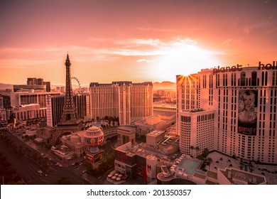 LAS VEGAS, NEVADA - MAY 7, 2014: Desert Sunrise Over Las Vegas Strip Hotel Resorts And Casinos. Over 39.7 Million People Visit Las Vegas Each Year.