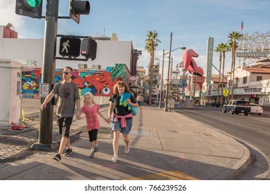 Las Vegas, Nevada, November 21, 2017: A Family Walking Downtown Las Vegas, Near The Famous Fremont Street Experience. Downtown Offers An Interesting Art Culture And Lifestyle Different From The Strip.