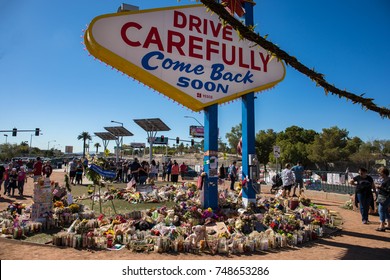 LAS VEGAS, NEVADA - OCTOBER 15, 2017 -  Flowers And Gifts At The Memorial Park By Mandalay Bay On The Vegas Strip At The Las Vegas Sign To Remember Victims Killed In The Las Vegas Mass Shooting.