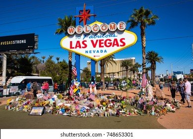 LAS VEGAS, NEVADA - OCTOBER 15, 2017 -  Flowers and gifts at the memorial park by Mandalay Bay on the Vegas Strip at the Las Vegas sign to remember victims killed in the Las Vegas mass shooting.