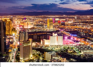 LAS VEGAS, NEVADA - SEPTEMBER 9: View of Las Vegas and the Las Vegas Strip from above on sunset on September 9, 2015. Las Vegas is known primarily for gambling, shopping and fine dining.