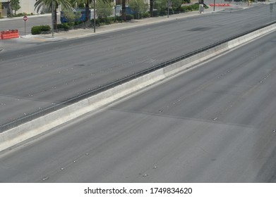 Las Vegas, Nevada / United States - May 27, 2020: A Street Concrete Barrier Separating The Empty Las Vegas Strip Streets. 
