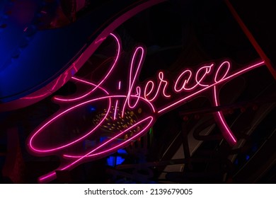 Las Vegas, Nevada, USA, February 6, 2019 - Giant Vintage Pink Liberace Sign In The Neon Museum Yard Seen At Night