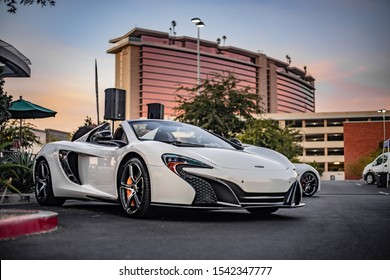 Las Vegas, Nevada / USA - October 24th, 2019 : White Mclaren 570s Spider parked at a car meet during sunset.