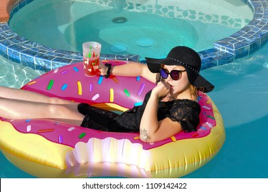Las Vegas, Nevada/USA - 05/05/18: Boho Girl Lounging In Pool