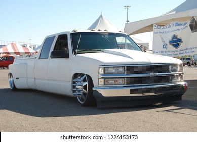 Las Vegas, Nevada/USA-August 6, 2011: White Custom Low Rider Truck With Custom Wheels And Grill At The 34th Annual Black Bikers Roundup Held At The Las Vegas Motor Speedway Hosted By African Americans