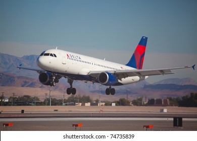 LAS VEGAS - NOVEMBER 15: Boeing 777 Delta landing on McCarran airport in Las Vegas, USA on November 15, 2010. Delta is major US airline and server over 300 destinations worldwide