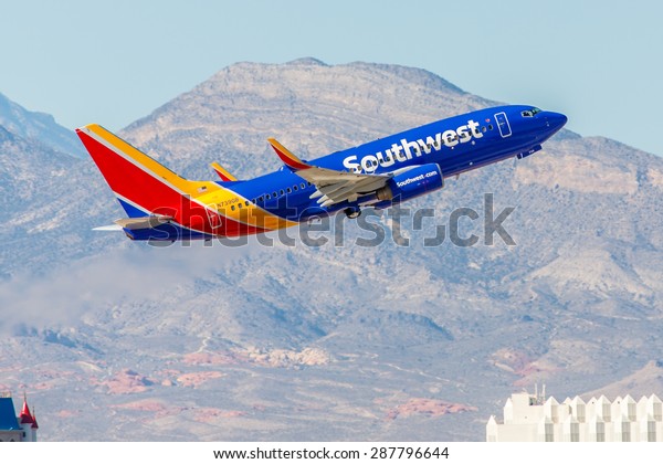 LAS\
VEGAS - NOVEMBER 3: Boeing 737 Southwest Airlines takes off from\
McCarran in Las Vegas, NV on November 3, 2014. Southwest is a major\
US airline and the world\'s largest low-cost\
carrier.