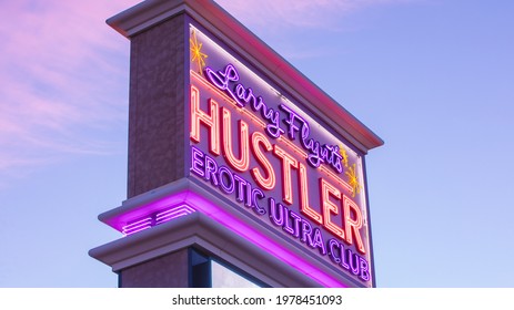 Las Vegas, NV 5-22-21: Neon Sign Of Larry Flynt’s Hustler Erotic Ultra Club Where Covid Vaccines Were Administered By SNHD. Located On Dean Martin Dr, This Is The Most Visited Strip Club In The City.