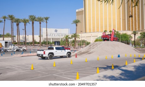 Las Vegas, NV 9-24-21: Toyota national dealer meeting held at Mandalay Bay Convention Center on the Las Vegas Strip. Brand new 2022 Toyota Tundras climbing off road gravel slope during the test drive.