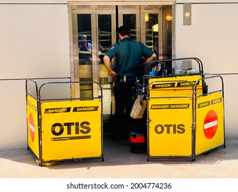 Las Vegas, NV - June 22, 2021: Otis Elevator Repair Technicians With Guarded-off Fence While Repairs Are Being Made.