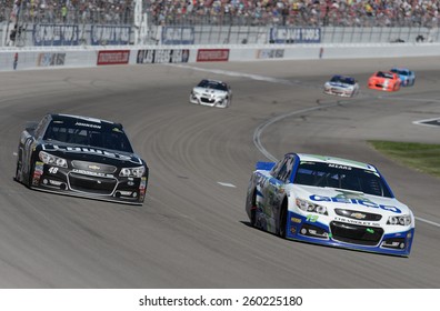 LAS VEGAS, NV - March 08: Jimmie Johnson (48) And Casey Mears (13) At The NASCAR Sprint Kobalt 400 Race At Las Vegas Motor Speedway On March 08, 2015