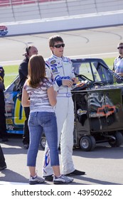 LAS VEGAS, NV - SEPTEMBER 26: Colin Braun And His Girlfriend Melissa Fields Talk In The Pit Area At The Sept. 26, 2009 Las Vegas 350.