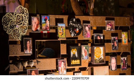 Las Vegas, NV, USA 10-1-2022: LV Community Healing Garden On The 5th Anniversary Of The Deadly 1October Shooting In 2017 That Killed 58 People. Face Photos Of Some Placed On A Decorative Wooden Wall.