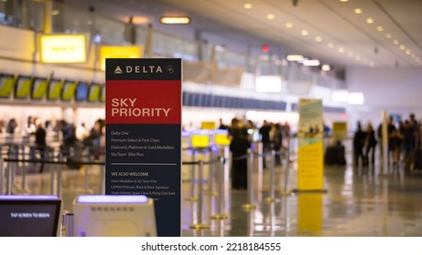 Las Vegas, NV, USA 10-23-2022: Sign Of Delta Sky Priority Check-in Lane For Passengers With Medallion Status And On Premium Cabins.
Harry Reid International Airport. Terminal In Bokeh In Background.