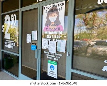 Las Vegas, NV, USA 7/29/2020 — A Dry Cleaner Advertising Their Selling Face Masks For An Unusually High Price Of $7 Each Or 2 For $10. Another Sign Reads “Masks Required Beyond This Point.”