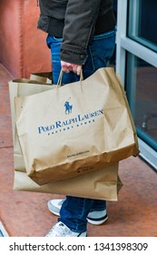 LAS VEGAS, NV, USA - FEBRUARY 2019: Person holding a paper carrier bag with a Polo Ralph Lauren logo in the Premium Outlets north in Las Vegas.