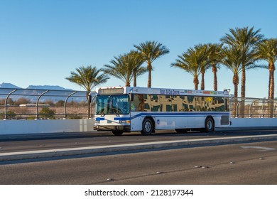 Las Vegas, NV, USA – February 17, 2022: McCarran Airport bus shuttle on Gilespie Street heading to the Car Rental Center in Las Vegas, Nevada. 