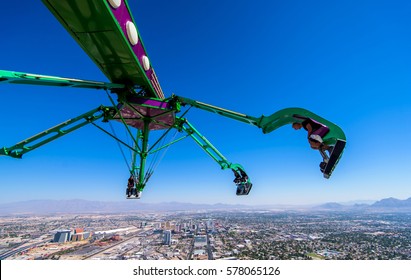 Las Vegas, NV, USA - September 05, 2016 : Insanity ride at top of the Stratosphere tower in Las Vegas Nevada. A massive mechanical arm extending out 64 feet over the edge of the Stratosphere Tower.