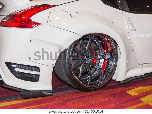 LAS VEGAS, NV/USA - OCTOBER\
31, 2016: Close up of a stanced Nissan car at the Specialty\
Equipment Market Association (SEMA) 50th Anniversary auto trade\
show.