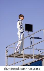 LAS VEGAS - SEPTEMBER 26:  NASCAR Driver, Colin Braun Stands On His Race Trailer To Watch Qualifying For The Sept. 26, 2009 Las Vegas 350.