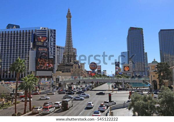 LAS VEGAS STRIP NV USA - NOVEMBER 2016: Las\
Vegas Strip daytime. Ballys Hotel & Casino, Planet Hollywood,\
Paris Hotel, MGM Grand, Aria Resort, Bellagio Hotel, Blue Sky, Palm\
tree\'s and road traffic.