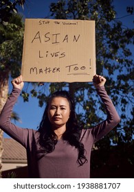 Las Vegas, United States-March 18, 2021:  Asian Woman Demonstrating Against Racial And Gender Violence.  Asian Woman Holding A Sign In Protest Against Discrimination.