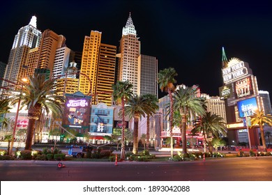 LAS VEGAS, USA - APRIL 13, 2014: People visit the famous Strip in Las Vegas. 15 of 25 largest hotels in the world are located at the strip with more than 60 thousand rooms.