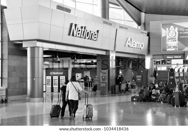 LAS VEGAS, USA -\
APRIL 13, 2014: Alamo and National car rental airport office in Las\
Vegas. Both brands are owned by Enterprise Holdings, company\
employing 74,000 people\
(2013).