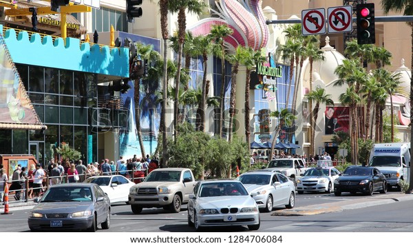LAS VEGAS, USA - APRIL 14,
2014: Car traffic in Las Vegas, Nevada. Nevada has one of lowest
car ownership rates in the USA (500 vehicles per 1000
people).