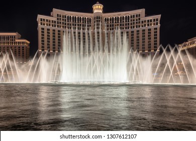 LAS VEGAS, USA - JULY 26, 2018: Bellagio hotel and casino at night in Las Vegas Strip on July 26, 2018 in Las Vegas, USA. The Strip is home to the largest hotels and casinos in the world.