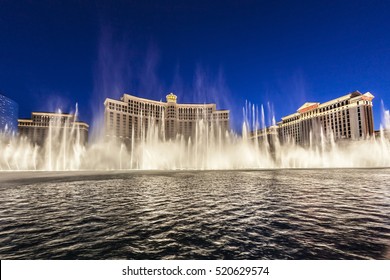 LAS VEGAS, USA - JUNE 15, 2012: Las Vegas Bellagio Hotel Casino, featured with its world famous fountain show, at night with fountains in Las Vegas, Nevada.