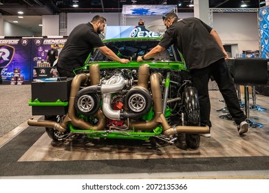 Las Vegas,  USA - November 5, 2021: Mechanics Working On A Muscle Car Engine Showcased At The SEMA Show