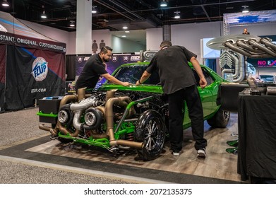 Las Vegas,  USA - November 5, 2021: Mechanics Working On A Muscle Car Engine Showcased At The SEMA Show