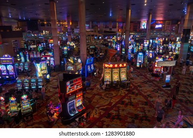 Las Vegas, USA - September 10, 2018: People Are Playing Slot Machines At MGM Casino